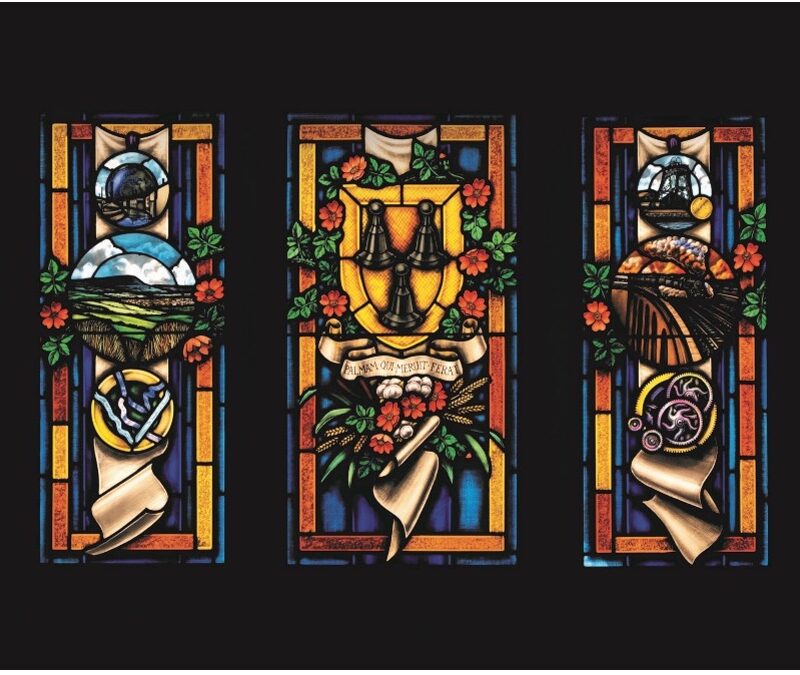 THE STUNNING STAINED GLASS WINDOWS AT THE LANDMARK WHICH CELEBRATE BURNLEYS PAST PRESENT AND FUTURE